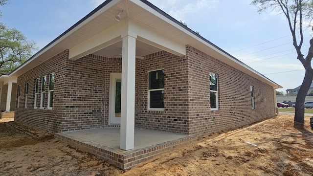 4200 Ida Coon Cir, Niceville, FL 32578 - view of side of property featuring brick siding