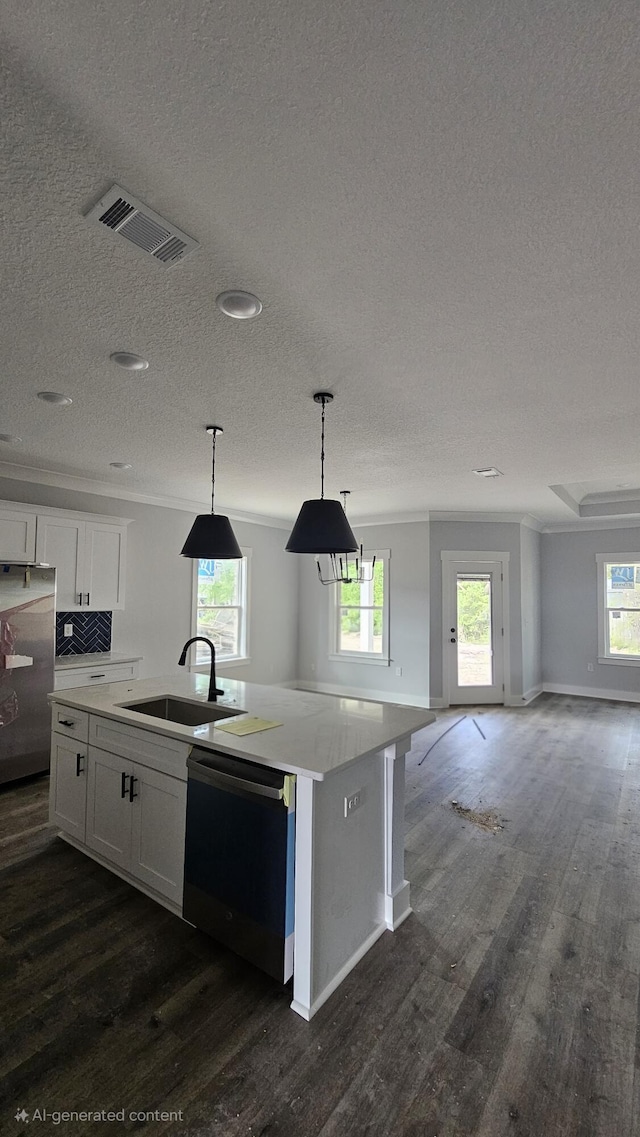 4200 Ida Coon Cir, Niceville, FL 32578 - kitchen featuring appliances with stainless steel finishes, a sink, open floor plan, a textured ceiling, and dark wood finished floors