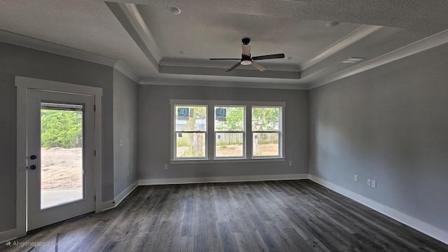 4200 Ida Coon Cir, Niceville, FL 32578 - empty room with a raised ceiling, healthy amount of natural light, ceiling fan, dark wood-style floors, and crown molding