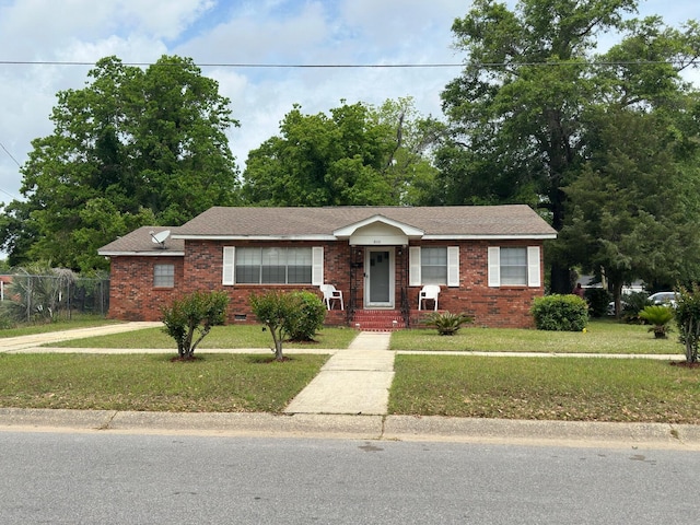 510 E Fisher St, Pensacola, FL 32503 - single story home with brick siding and a front lawn