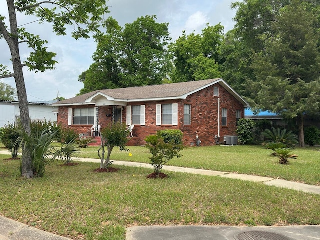510 E Fisher St, Pensacola, FL 32503 - ranch-style home featuring a front yard, central air condition unit, and brick siding