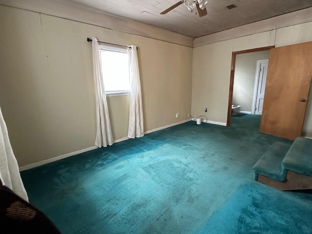 510 E Fisher St, Pensacola, FL 32503 - spare room featuring a ceiling fan, carpet flooring, and baseboards