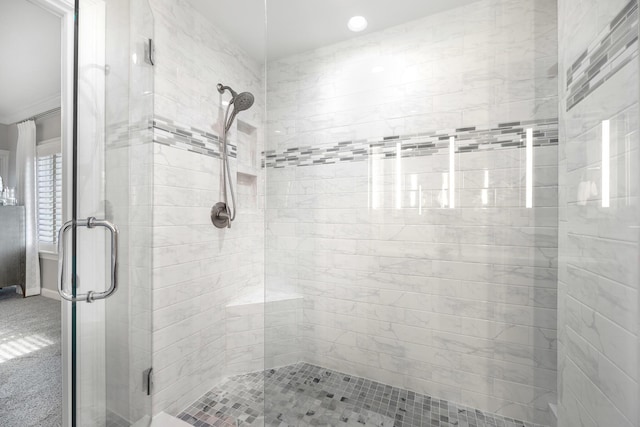bathroom with a shower stall and recessed lighting