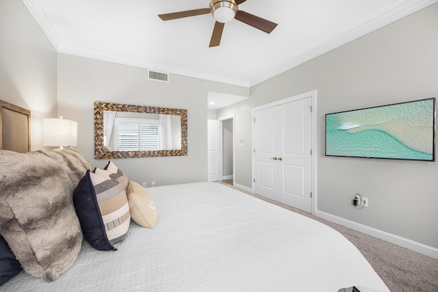 bedroom with crown molding, baseboards, and visible vents