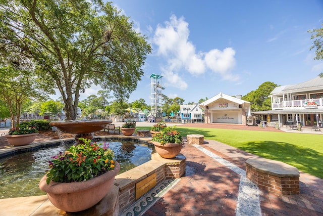 view of community featuring a lawn