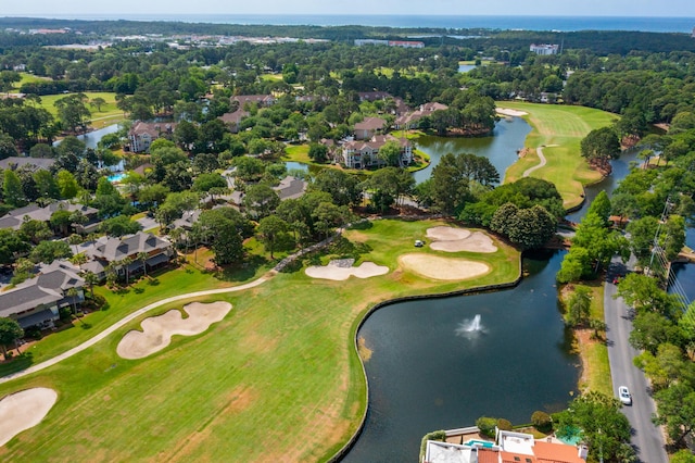birds eye view of property with a water view, view of golf course, and a residential view