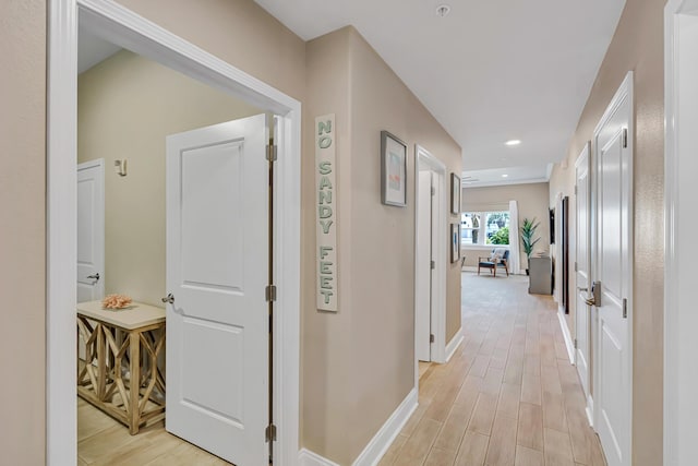 732 Scenic Gulf Dr Unit D103, Miramar Beach, FL 32550 - hallway featuring light wood-style flooring, baseboards, and recessed lighting