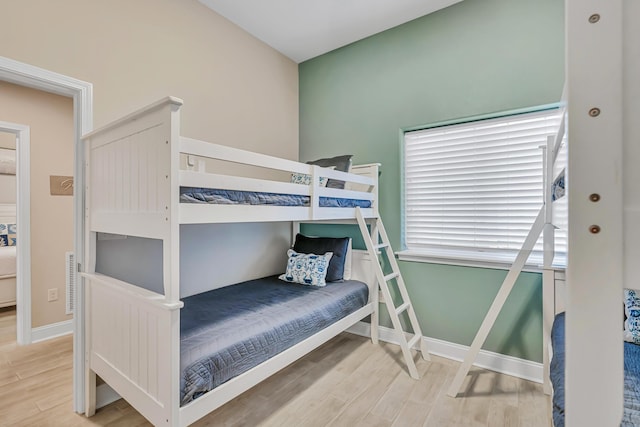 732 Scenic Gulf Dr Unit D103, Miramar Beach, FL 32550 - bedroom with wood finished floors and baseboards