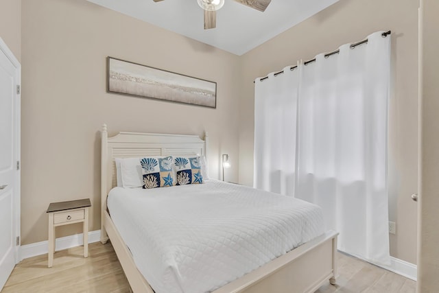 732 Scenic Gulf Dr Unit D103, Miramar Beach, FL 32550 - bedroom with baseboards, a ceiling fan, and wood finished floors