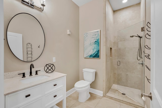 732 Scenic Gulf Dr Unit D103, Miramar Beach, FL 32550 - bathroom with a stall shower, toilet, baseboards, tile patterned flooring, and vanity