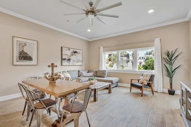 732 Scenic Gulf Dr Unit D103, Miramar Beach, FL 32550 - dining room with ceiling fan, visible vents, baseboards, and ornamental molding