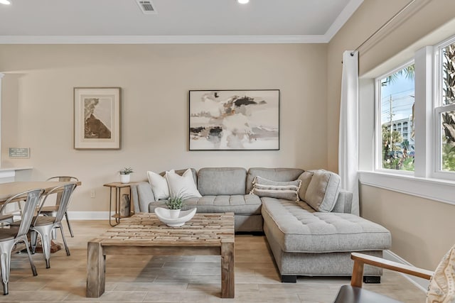 732 Scenic Gulf Dr Unit D103, Miramar Beach, FL 32550 - living room with visible vents, baseboards, ornamental molding, and recessed lighting