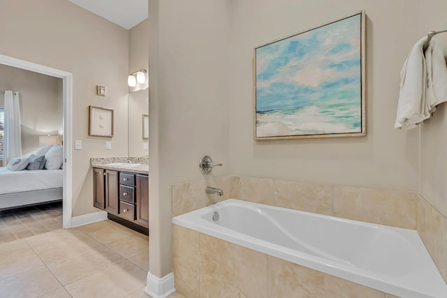 732 Scenic Gulf Dr Unit D103, Miramar Beach, FL 32550 - ensuite bathroom featuring tile patterned floors, connected bathroom, vanity, and a bath