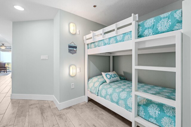 11807 Front Beach Rd # 1-309, Panama City Beach, FL 32407 - bedroom featuring wood finished floors, recessed lighting, and baseboards