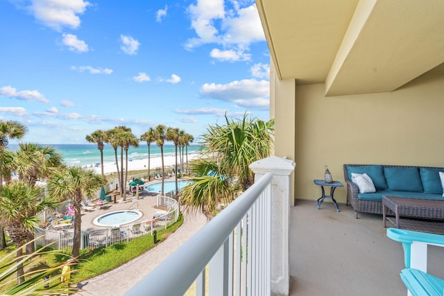 11807 Front Beach Rd # 1-309, Panama City Beach, FL 32407 - balcony featuring a water view and a view of the beach
