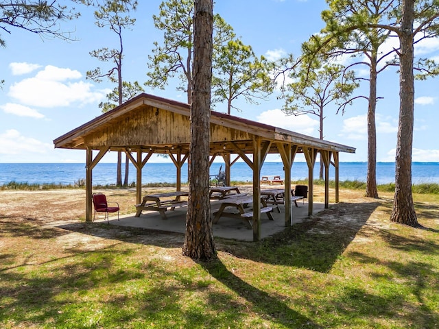 view of home's community featuring a gazebo and a water view