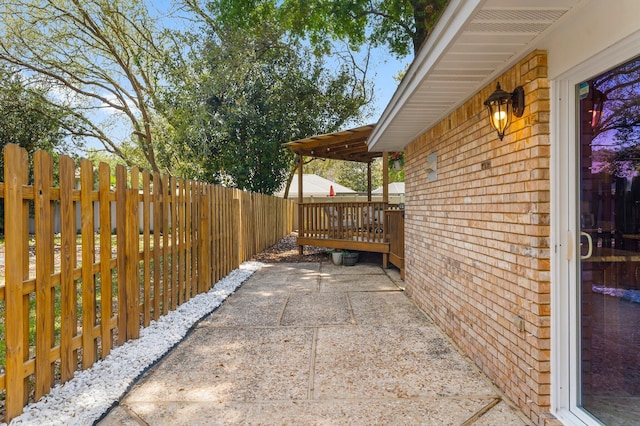 view of patio with fence
