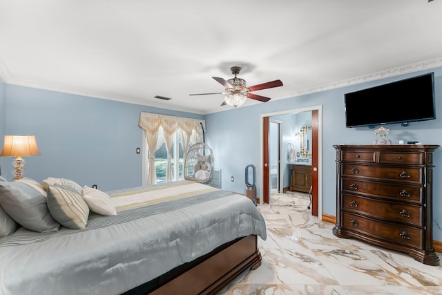 bedroom with light marble finish flooring, ornamental molding, connected bathroom, a ceiling fan, and baseboards