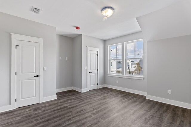 9620 Indian Stone Ct Lot 7, Navarre, FL 32566 - interior space featuring baseboards, visible vents, and dark wood-type flooring