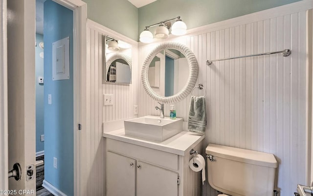 bathroom with toilet and vanity