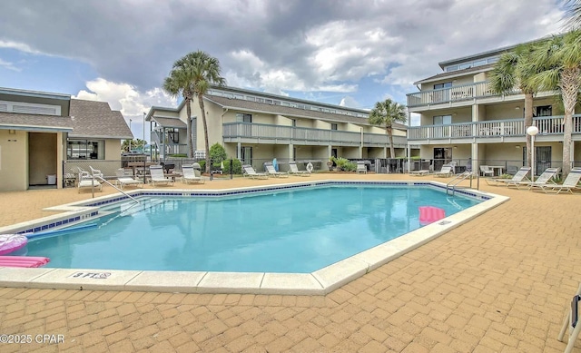 community pool featuring a patio
