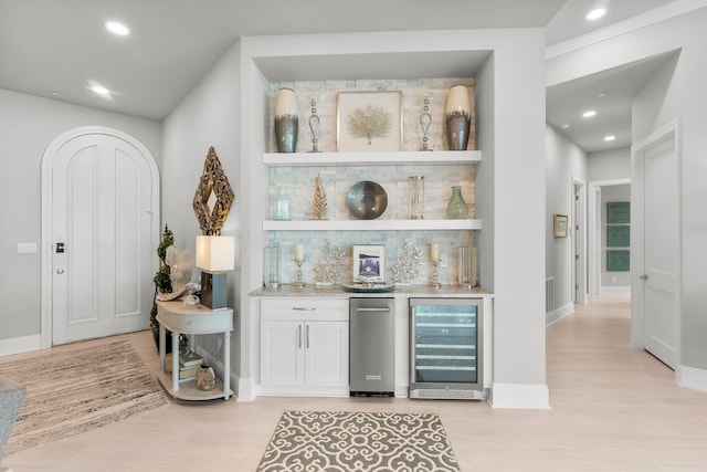 320 Harbor Blvd Unit 1201, Destin, FL 32541 - bar featuring recessed lighting, light wood-type flooring, bar area, and wine cooler
