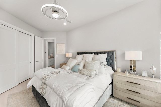 320 Harbor Blvd Unit 1201, Destin, FL 32541 - bedroom with recessed lighting, visible vents, light wood finished floors, and a closet