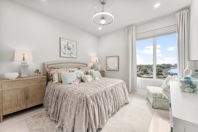 320 Harbor Blvd Unit 1201, Destin, FL 32541 - bedroom with recessed lighting, baseboards, and light wood finished floors