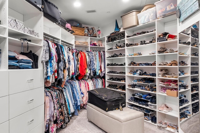 320 Harbor Blvd Unit 1201, Destin, FL 32541 - walk in closet featuring carpet flooring and visible vents