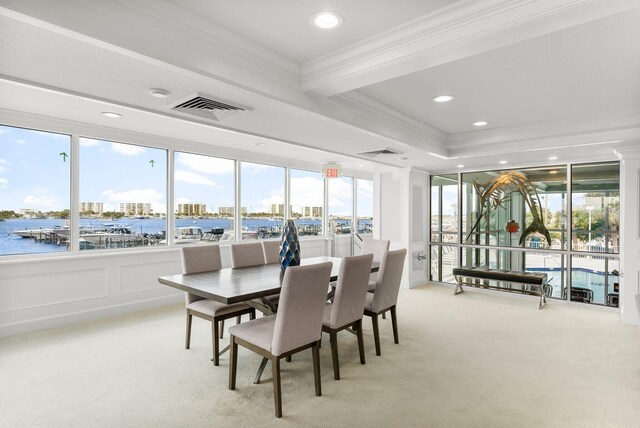 320 Harbor Blvd Unit 1201, Destin, FL 32541 - dining area with visible vents, ornamental molding, and light colored carpet