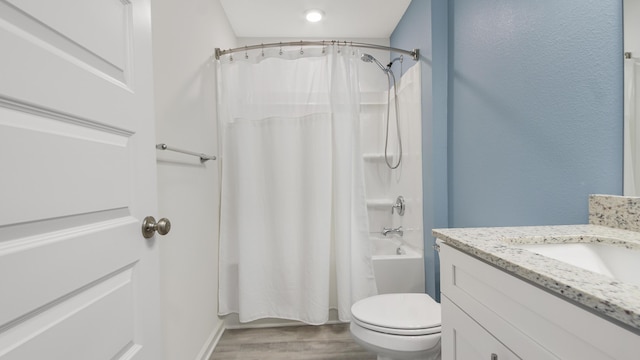 58 Eunola Ln, Freeport, FL 32439 - bathroom with toilet, shower / bathtub combination with curtain, wood finished floors, and vanity