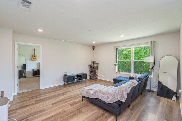 6629 Spyglass Hill Rd, Laurel Hill, FL 32567 - living area with visible vents, recessed lighting, light wood-style flooring, and baseboards