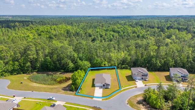 6629 Spyglass Hill Rd, Laurel Hill, FL 32567 - drone / aerial view with a wooded view
