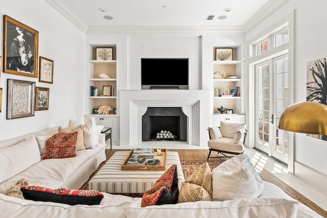 30 N Charles St, Inlet Beach, FL 32461 - living room with built in shelves, crown molding, and a premium fireplace