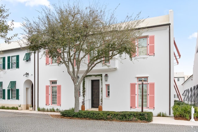 30 N Charles St, Inlet Beach, FL 32461 - view of front of house featuring stucco siding