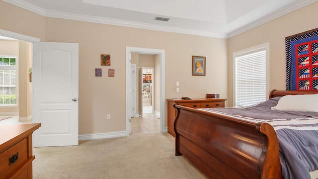 174 Mango Ln, Freeport, FL 32439 - bedroom featuring light colored carpet, baseboards, crown molding, and visible vents