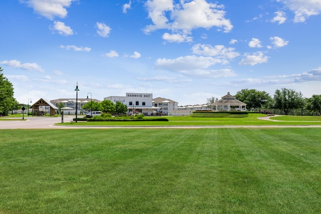 174 Mango Ln, Freeport, FL 32439 - surrounding community featuring a gazebo and a lawn