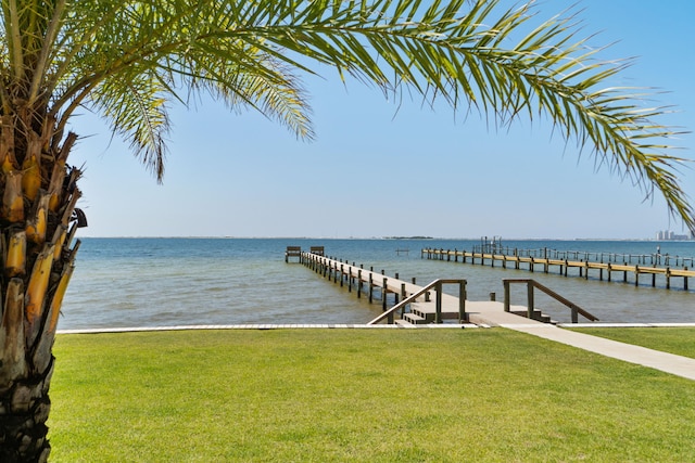 9124 Orlando Ave, Navarre, FL 32566 - dock with a lawn and a water view