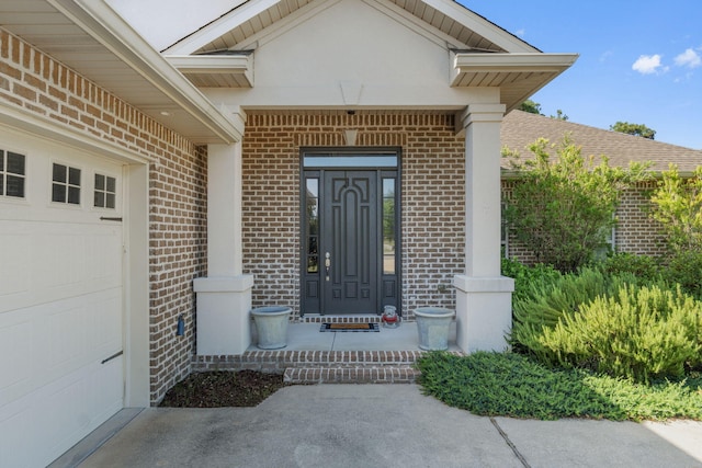 9124 Orlando Ave, Navarre, FL 32566 - property entrance featuring brick siding and a garage
