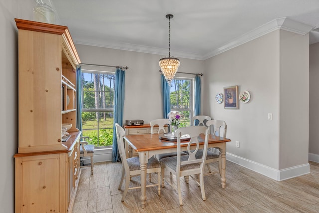 9124 Orlando Ave, Navarre, FL 32566 - dining room featuring healthy amount of natural light, a chandelier, ornamental molding, wood finish floors, and baseboards