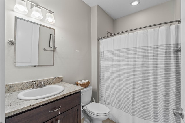 9124 Orlando Ave, Navarre, FL 32566 - full bathroom with toilet, vanity, and a shower with curtain