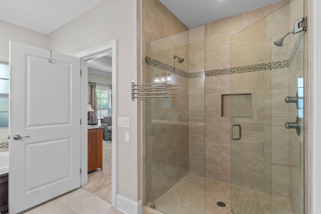 9124 Orlando Ave, Navarre, FL 32566 - full bath featuring a stall shower, tile patterned floors, and baseboards