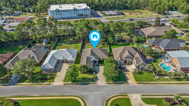 9124 Orlando Ave, Navarre, FL 32566 - aerial view of property's location featuring nearby suburban area and a pool