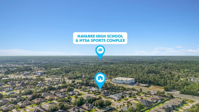 9124 Orlando Ave, Navarre, FL 32566 - aerial view of residential area with a heavily wooded area