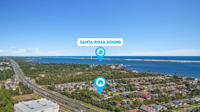 9124 Orlando Ave, Navarre, FL 32566 - aerial view of residential area with a main thoroughfare and a nearby body of water