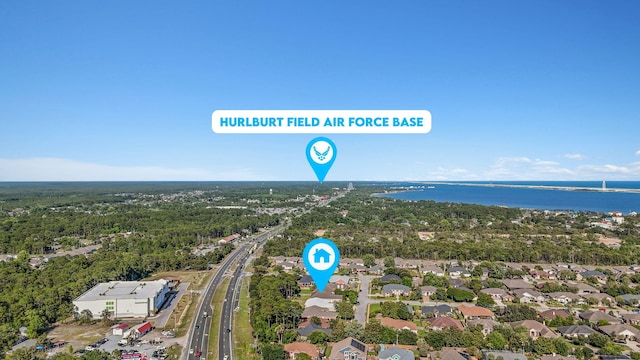 9124 Orlando Ave, Navarre, FL 32566 - aerial view of residential area featuring a main thoroughfare and a nearby body of water