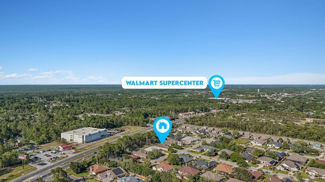 9124 Orlando Ave, Navarre, FL 32566 - aerial perspective of suburban area featuring a heavily wooded area
