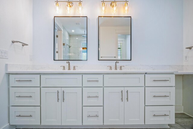 40 Cote D Azur Dr, Santa Rosa Beach, FL 32459 - bathroom with a shower stall, double vanity, and a sink
