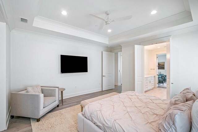 40 Cote D Azur Dr, Santa Rosa Beach, FL 32459 - bedroom featuring recessed lighting, visible vents, a raised ceiling, and light wood-type flooring