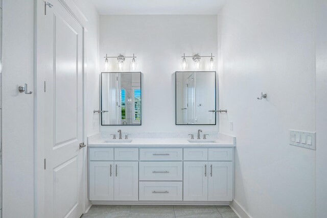 40 Cote D Azur Dr, Santa Rosa Beach, FL 32459 - full bath with baseboards, double vanity, and a sink
